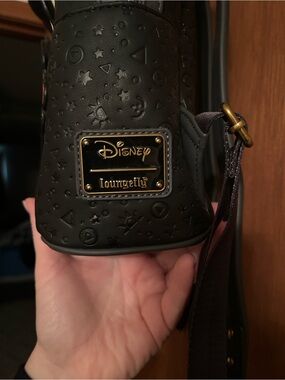 Loungefly Black Embossed Disney Backpack with Gold Plaque